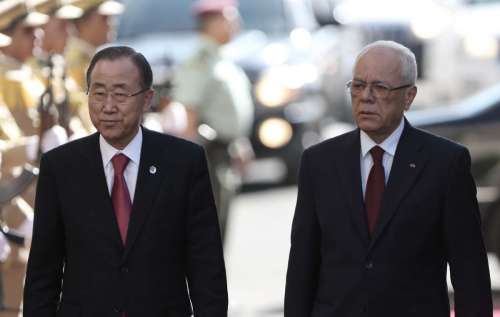 United Nations Secretary General Ban Ki-Moon and Palestinian presidency's secretary general Tayeb Abdul-Rahim review an honor guard in the West Bank city of Ramallah 