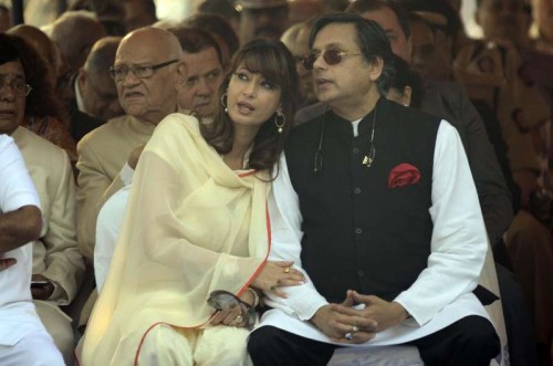 A file photo of Union Minister of State for Human Resource Development Shashi Tharoor and his wife Sunanda Pushkar during an event. She was found dead in a room of luxury hotel of New Delhi on Jan.17, 2014. 