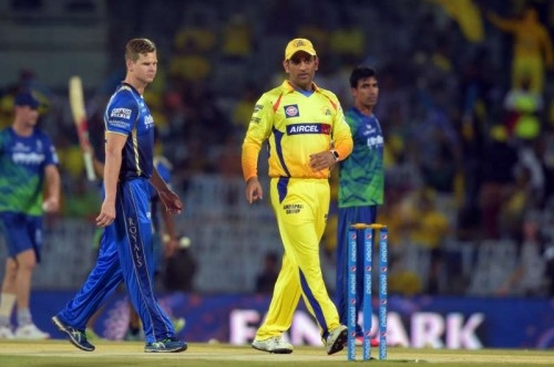 Rajasthan Royals captain Steve Smith and Chennai Super Kings captain MS Dhoni during an IPL 2015 match between Rajasthan Royals and Chennai Super Kings at M. A. Chidambaram Stadium in Chennai on May 10, 2015. 