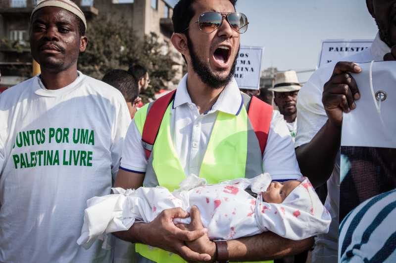 People participate in a pro-palestinian demonstration organised by the Mozambican Human Rights League in Maputo, Mozambique