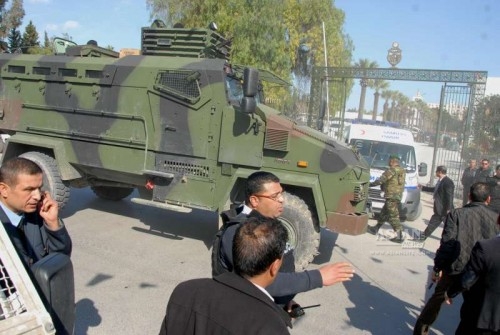 Police officers stand guard near Bardo Museum after an armed attack on the museum in Tunis, Tunisia, on March 18, 2015. At least 19 people were killed, including 17 tourists, in the attack on Wednesday, Tunisia's Prime Minister Habib Essid said. 