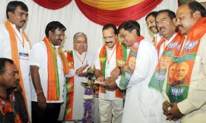 Union Railway Minister DV Sadananda Gowda with BJP leader Govind Karjol and others during a BJP meeting in Bangalore 