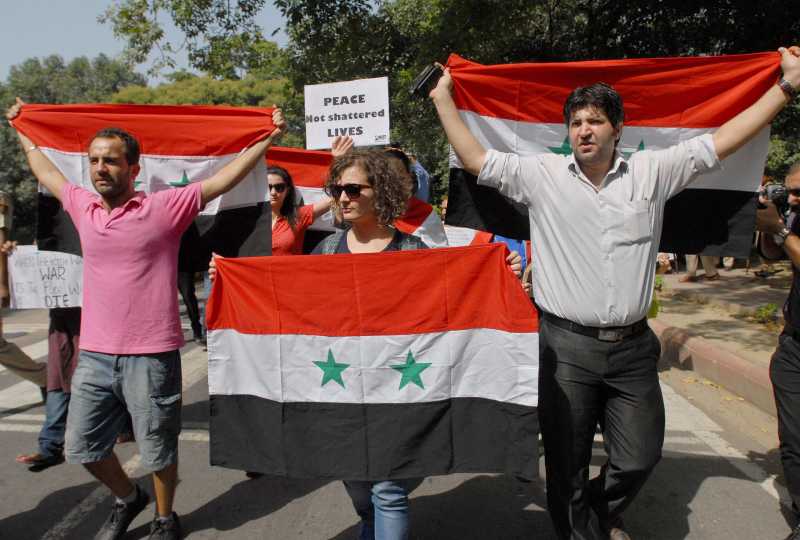 Syria - people protest against US UK