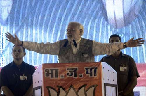 Prime Minister Narendra Modi addresses a BJP rally in Borivali of Mumbai on Oct.12, 2014. (Photo: Sandeep Mahankal/IANS)