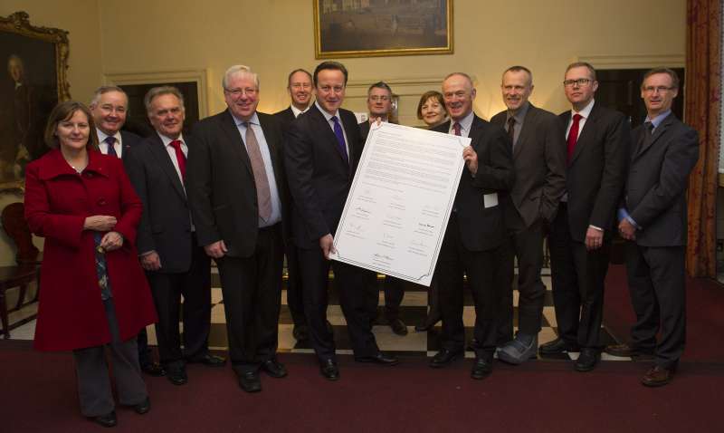 Sir Albert Bore, Core Cities leaders and Prime Minister David Cameron and Transport Secretary Patrick McLoughlin pose with a petition launched by the cities pressing for HS2 to go ahead - File pic