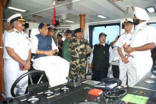 Union Home Minister Rajnath Singh onboard Coast Guard offshore patrol vessel ICGS Vijit in Porbandar of Gujarat on September 10, 2014. (Photo: IANS/PIB)