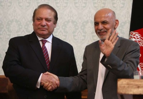 Afghan President Ashraf Ghani (R) shakes hands with Pakistani Prime Minister Nawaz Sharif after a joint press conference in Kabul, Afghanistan on May 12, 2015. Pakistani Prime Minister Nawaz Sharif said Tuesday that a peaceful Afghanistan would benefit Pakistan and Islamabad supports the Afghan-led and Afghan-owned peace process