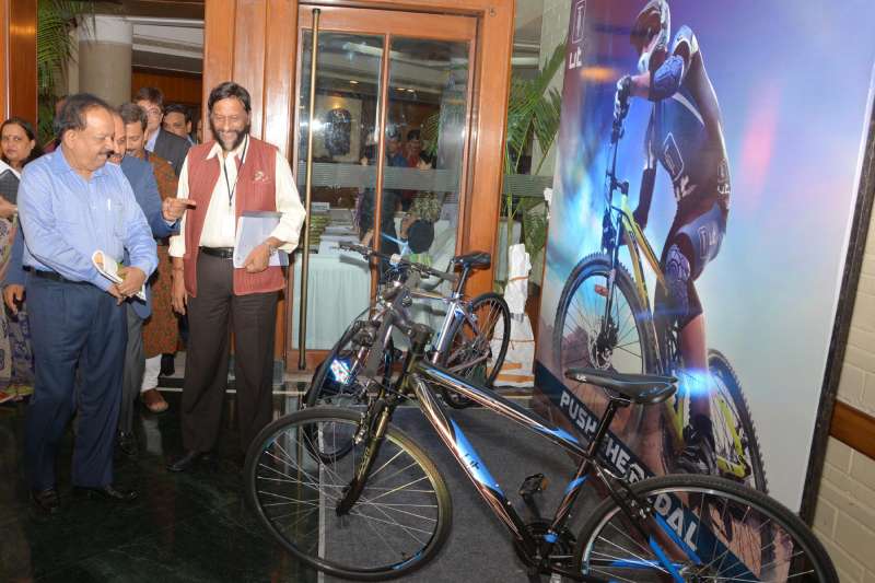 Union Minister for Health and Family Welfare Dr. Harsh Vardhan looks at a cycle during the release of a study report titled `Peddling towards a Greener India: A Report on Promoting Cycling in the Country` prepared by The Energy and Resources Institute (TERI), in New Delhi