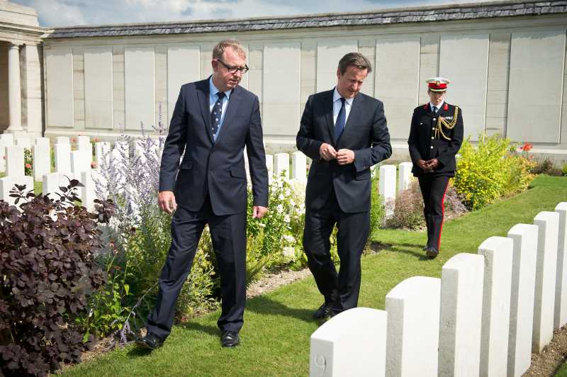 UK PM David Cameron meets with Richard Nichol from the Commonwealth War Graves Association and Harry Mount at Dud Corner Cemetery in France.