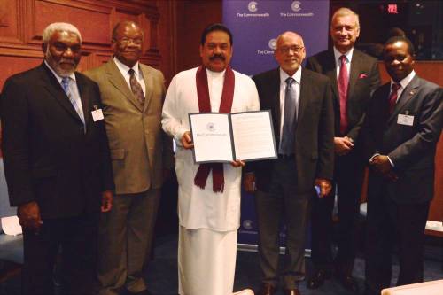 Commonwealth Secretary-General Kamalesh Sharma with Sri Lankan President Mahinda Rajapaksa  and others during the release of 2015-agenda