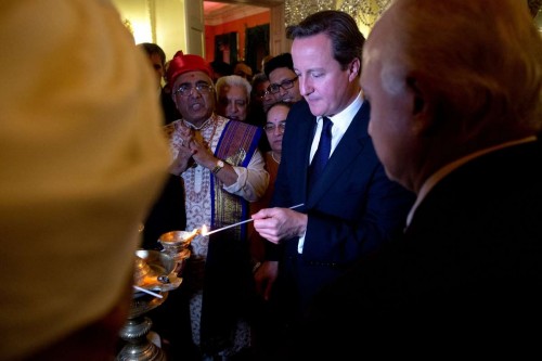 Prime Minister David Cameron lights the Lamp to inaugurate the Diwali celebrations at No 10