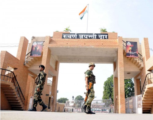 Attari: BSF soldiers guard Swaran Jayanti Dwar at Attari Indo-Pak international border. Security has been beefed-up at the border following a suicide bomb attack at Wagah in Pakistan that left 60 people dead 