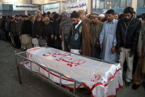 Mourners attend the funeral of a student who was killed in an attack by militants on an army-run school in northwest Pakistan's Peshawar on Dec. 16, 2014.