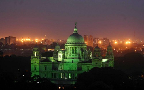 A view of Victoria Memorial lit-up in green light