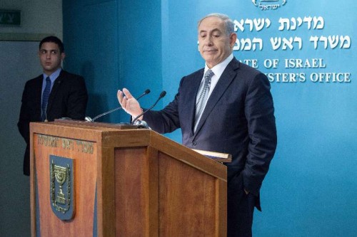  Israeli Prime Minister Benjamin Netanyahu addresses a press conference at the Prime Minister's office in Jerusalem, on Dec. 2, 2014. Israeli Prime Minister Benjamin Netanyahu announced his support for dispersing the Knesset (parliament) and conducting early elections amid a coalition crisis. During a press conference at his Jerusalem office, Netanyahu also said he has ordered to fire Justice Minister Tzipi Livni and Finance Minister Yair Lapid, who he said plotted against him by outspokenly criticizing his policies. 