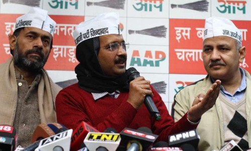 Aam Aadmi Party (AAP) leader Arvind Kejriwal addresses press in New Delhi, on Jan 10, 2015. Also seen Yogendra Yadav and Manish Sisodia. 