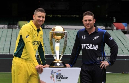 New Zealand ODI team captain Brendon McCullum and Australian ODI team captain Michael Clarke during a photo shoot with the Cricket World Cup trophy at the Melbourne Cricket Ground in Melbourne, Australia, on March 28, 2015.