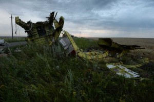 The debris at the crash site of a passenger plane near the village of Grabovo, Ukraine. A Malaysian flight crashed Thursday in eastern Ukraine near the Russian border, with all the 280 passengers and 15 crew members on board reportedly having been killed. 