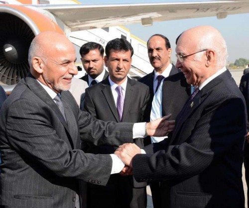 Photo released by Press Information Department (PID) on Nov. 14, 2014 shows Afghan President Ashraf Ghanibeing welcomed by Sartaj Aziz National Security Advisor to the Prime Minister on National Security and Foreign Affairs of Pakistan at the Nur Khan air base in Rawalpindi, Pakistan. Afghan President Ashraf Ghani arrived in Pakistan on Friday for a two-day official visit for important talks on key security issues and expanding economic ties, officials said. 