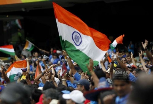 Indian fans wave the tricolour at the Melbourne Cricket Ground during an ICC World Cup 2015 match between India and South Africa in Melbourne, Australia on Feb 22, 2015. 
