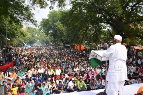 Anna Hazare addresses during a demonstration organised to protest against the land acquisition ordinance at Jantar Mantar in New Delhi on Feb 25, 2015.