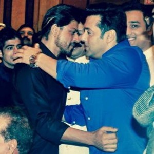 Actors Shahrukh Khan and Salman Khan during the Iftar Party hosted by Baba Siddique in Mumbai on July 6, 2014. (Photo: IANS)