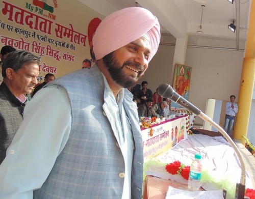 Cricketer turned politician Navjot Singh Sidhu addresses during a public meeting in Kanpur. FILE PHOTO