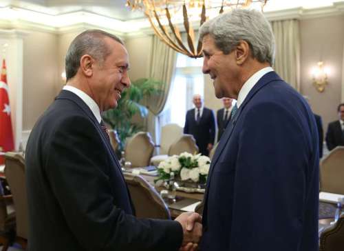 Turkish President Recep Tayyip Erdogan  meets with visiting United States Secretary of State John Kerry at the Presidential Palace in Ankara, Turkey.