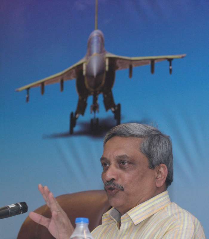 Indian Defence Minister Manohar Parrikar addresses a press conference during the inauguration of Aero India-2015 Air Show at Yelahanka Air-force Station, in Bengaluru on Feb 18, 2015 