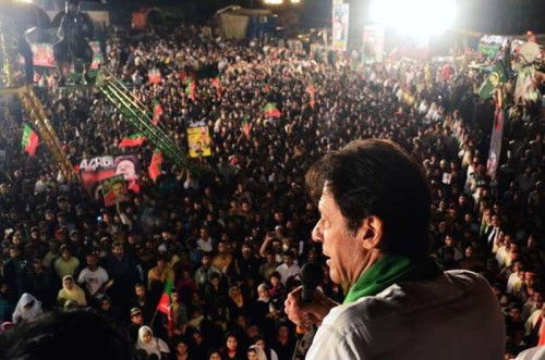 Leader of Pakistan Tehrik-e-Insaf party Imran Khan addresses supporters during an anti-government protest near the prime minister's residence in Islamabad, capital of Pakistan on Sept. 5, 2014. An opposition party, which has staged anti-government sit-ins in Islamabad and demanded resignation of Prime Minister Nawaz Sharif, held talks with a government team on Friday to defuse the political tensions. 