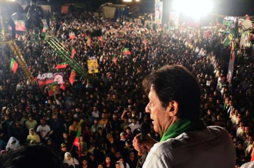 Leader of Pakistan Tehrik-e-Insaf party Imran Khan addresses supporters during an anti-government protest near the prime minister's residence in Islamabad, capital of Pakistan. An opposition party, which has staged anti-government sit-ins in Islamabad and demanded resignation of Prime Minister Nawaz Sharif, held talks with a government team on Friday to defuse the political tensions. 