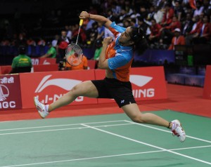 Indian badminton player Saina Nehwal in action against he Indonesian counterpart Lindaweni Fanetri during quarter-final match of Uber Cup at Siri Fort in New Delhi on May 22, 2014. Saina defeated Fanetri by 2-0. (Photo: IANS)