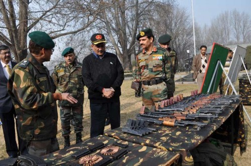 Jammu and Kashmir: Union Defence Minister Manohar Parrikar inspects the weapons and ammunition seized by the army during its various operations against the militants at the Chinar Corps camp in Jammu and Kashmir on Dec 11, 2014.