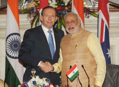 Prime Minister Narendra Modi with Australian Prime Minister Tony Abbott during a joint press conference in New Delhi on Sept 5, 2014. FILE PHOTO