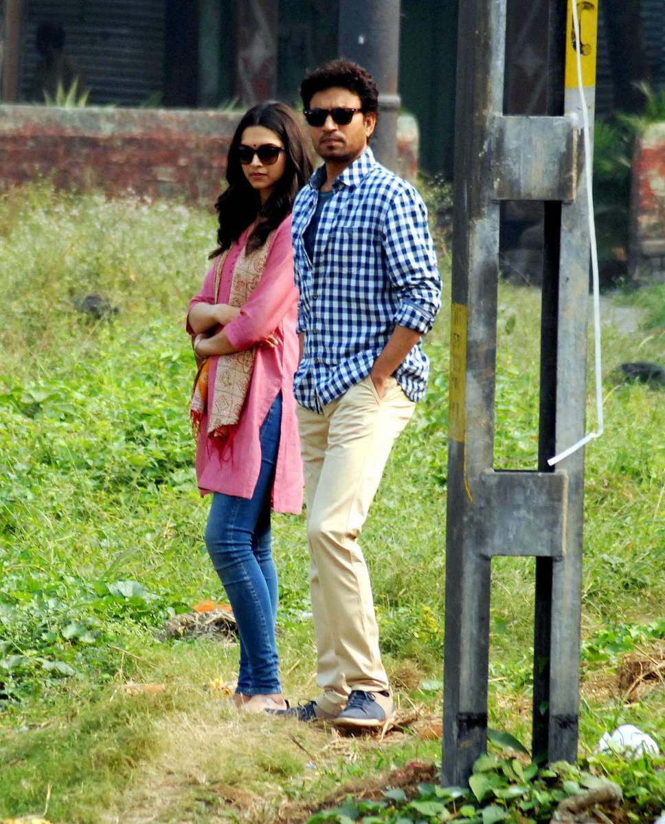 Actors Deepika Padukone and Irrfan Khan shoots for their upcoming film `Piku` at Bag Bazar in Kolkata