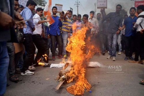 NSUI workers stage a demonstration against BJP leader Subramanian Swamy in Nagaon of Assam on March 16, 2015.