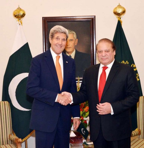 Photo released by Pakistan's Press Information Department (PID) on Jan. 12, 2015 shows Pakistani Prime Minister Nawaz Sharif (R) shaking hands with US Secretary of State John Kerry in Islamabad, capital of Pakistan. John Kerry on Monday assured support to Pakistan in his meeting with Nawaz Sharif in Islamabad, officials said. Kerry arrived in Islamabad Monday evening on a two-day visit following his trip to India.