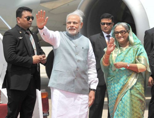 Prime Minister Narendra Modi being welcomed by the Prime Minister of Bangladesh, Sheikh Hasina on his arrival, in Hazrat Shahjalal Airport, Dhaka on June 06, 2015.