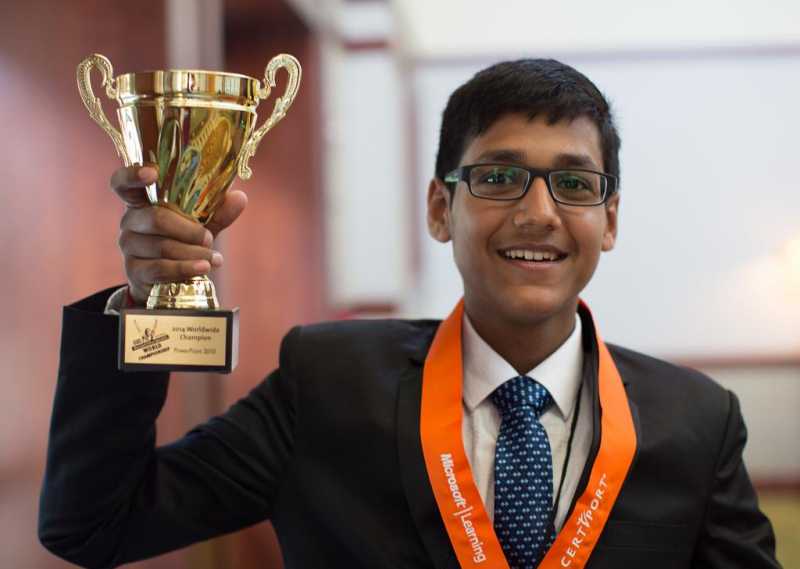 2014 Microsoft Office Specialist World Champion in PowerPoint 2010, Arjit Kansal from India with his trophy in Anaheim, California, United States of America on Aug 4, 2014. (Photo: IANS)