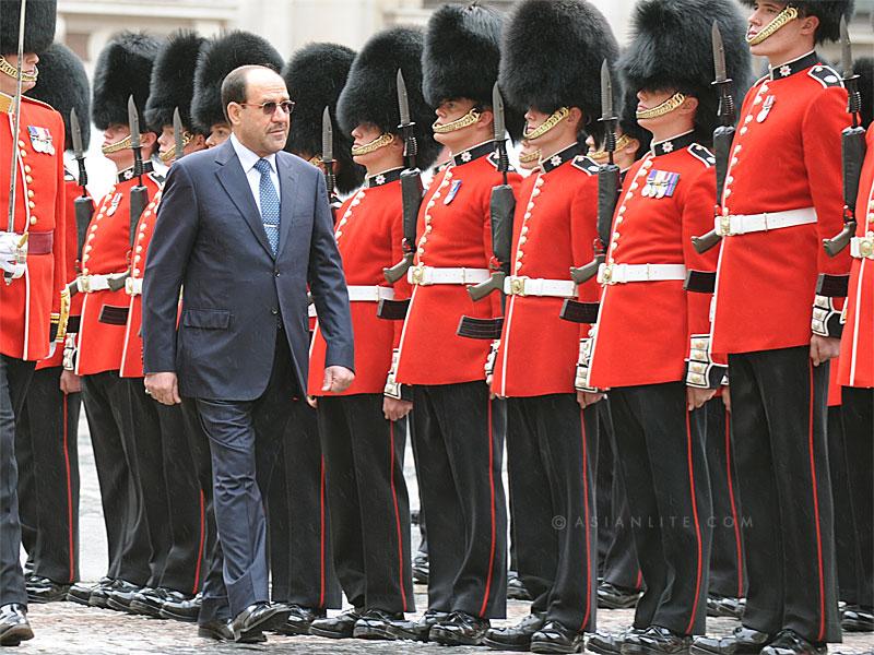 Iraqi President Nouri-al Maliki inspecting a guard of honour in London