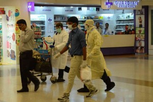 A man who is suspected to have contracted Ebola virus being taken to RML Hospital from IGI Terminal in New Delhi on Aug 26, 2014.