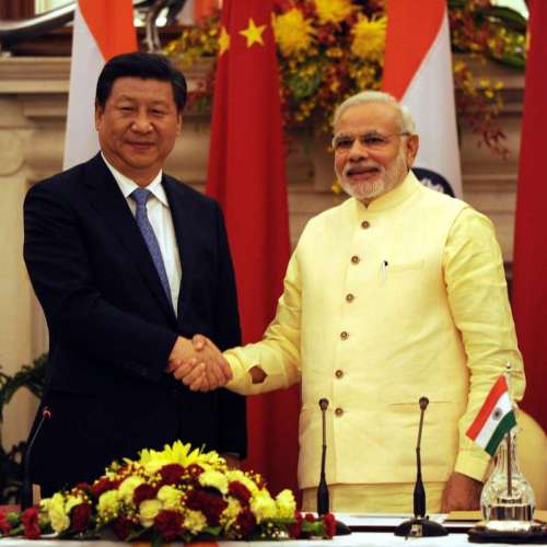 Prime Minister Narendra Modi with Chinese President Xi Jinping during a press conference at Hyderabad House in New Delhi 