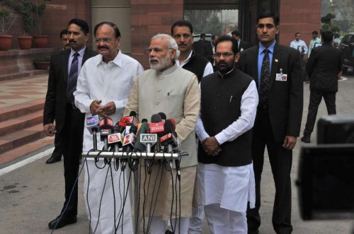 Prime Minister Narendra Modi addresses press ahead of the Budget Session of Parliament in New Delhi, on Feb 23, 2015. Also seen the Union Minister for Urban Development, Housing and Urban Poverty Alleviation and Parliamentary Affairs M. Venkaiah Naidu, the Union Minister of State for Skill Development and Entrepreneurship (Independent Charge) and Parliamentary Affairs Rajiv Pratap Rudy and and the Union Minister of State for Minority Affairs and Parliamentary Affairs Mukhtar Abbas Naqvi. 