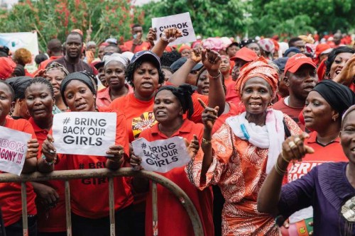 Protesters gather during a rally to demand the return of some 200 missing school girls abducted by Boko Haram in the state of Lagos, Nigeria, May 13, 2014.