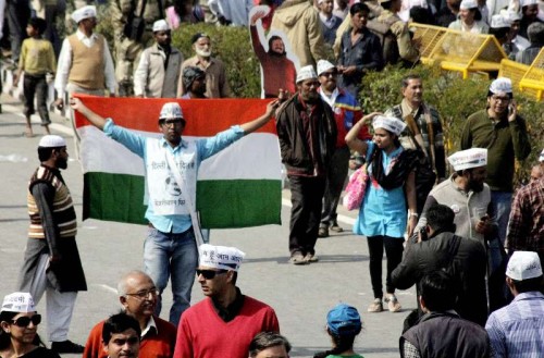 Aam Aadmi Party (AAP) supporters at the swearing-in ceremony of Delhi Chief Minister Arvind Kejriwal at Ramlila Maidan in New Delhi, on Feb 14, 2015. 