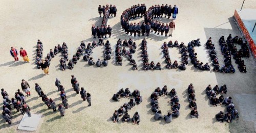 Students stand in the formation of `ICC World CUP 2015` in Amritsar on Feb 12, 2015.