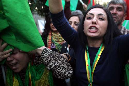  Kurdish women living in Greece protest during a pro-Kurd demonstration against attacks launched by Islamic State militants targeting the Syrian city of Kobane and the lack of action by the Turkish government in central Athens, Greece, on Oct. 13, 2014. Intensified air strikes helped Kurdish militias pushed back Islamic State militants' fighting for Kobane as pressure mounted for more international action to save the key Syrian border town.