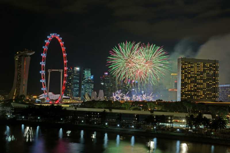 Fireworks light up the sky during the National Day Parade in Singapore. Singapore celebrates the 49th anniversary of independence on Saturday. 