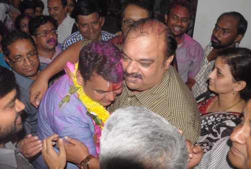 Nagpur: Maharashtra BJP chief Devendra Fadnavis celebrates party's success in in recently concluded Maharashtra and Haryana Assembly Polls with his family in Nagpur on Oct.19, 2014. The party won the Haryana Assembly Polls and has won more than 110 seats in Maharashtra. 