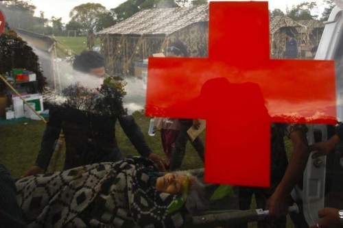 An injured is carried to an army school for medical treatment in Bhaktapur, Nepal